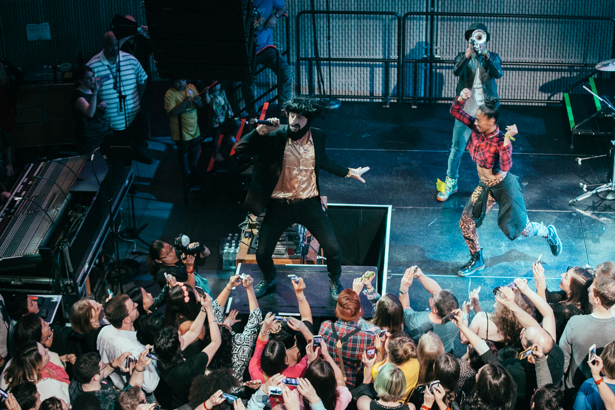 Macklemore and Ryan Lewis made a special appearance at EMP’s Vivid event for the new exhibition Spectacle. The new exhibit is all about music videos so in the spirit Macklemore and Ryan Lewis performed their award winning Thrift Shop and Can’t Hold Us to a screaming crowd. May 16th 2014. (Joshua Lewis / Seattle Refined)