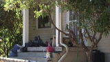 Homeless squatters take over abandoned home, clash with neighbors