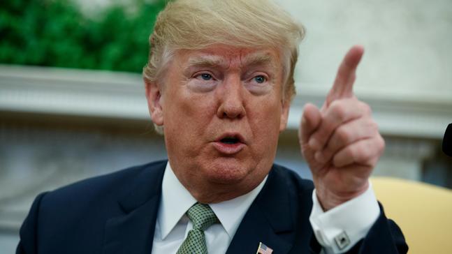 Trump threatens to veto spending bill over DACA, wall funding