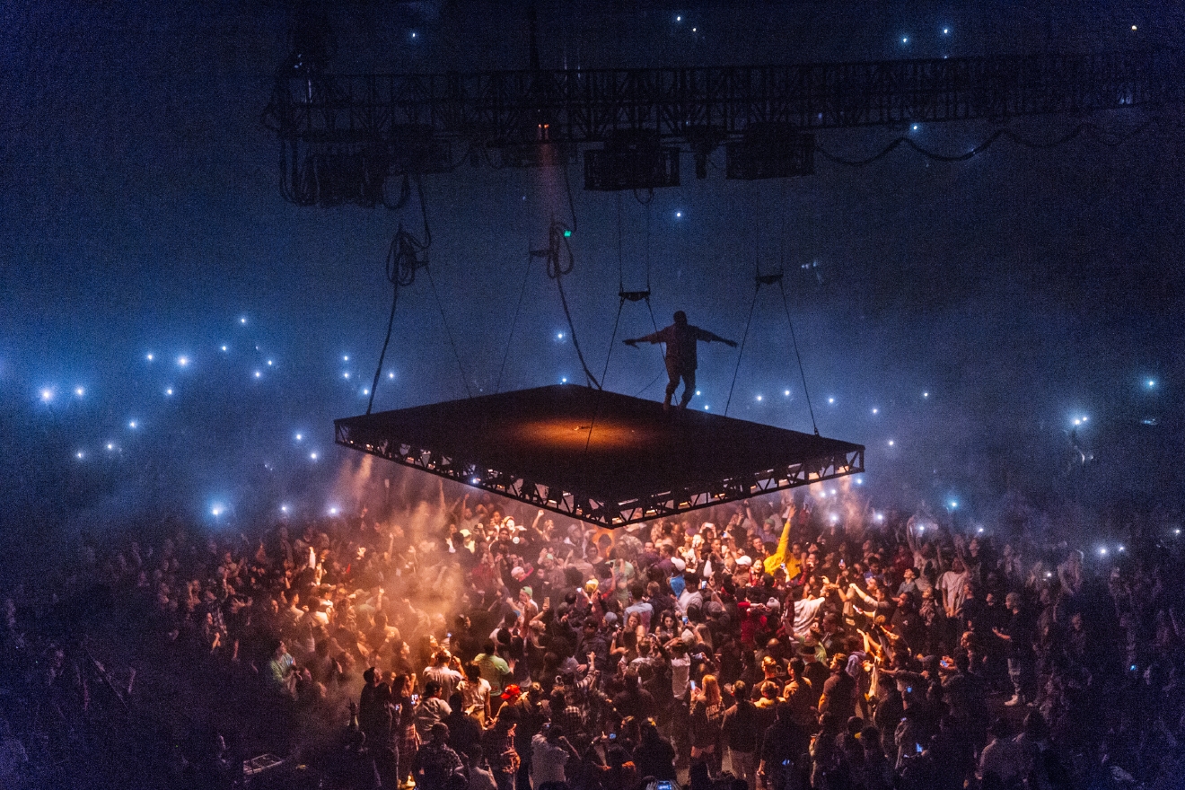 Photos Kanye West floats into Seattle on a suspended stage Seattle