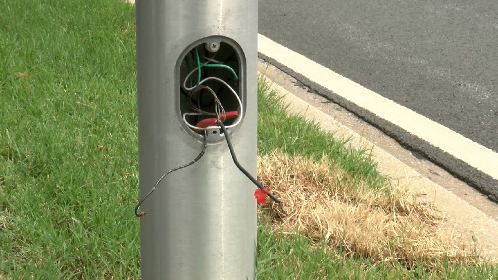 Electric wiring left fully exposed along busy road finally fixed WJLA