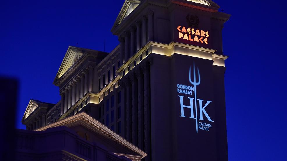 a hells kitchen logo is displayed on the side of one of the caesars palace towers during the grand opening of gordon ramsay hells kitchen at caesars - Hells Kitchen Las Vegas 2 a hells kitchen logo is displayed on the side of one of the caesars palace towers during the grand opening of gordon ramsay hells kitchen at caesars - Hells Kitchen Las Vegas 2